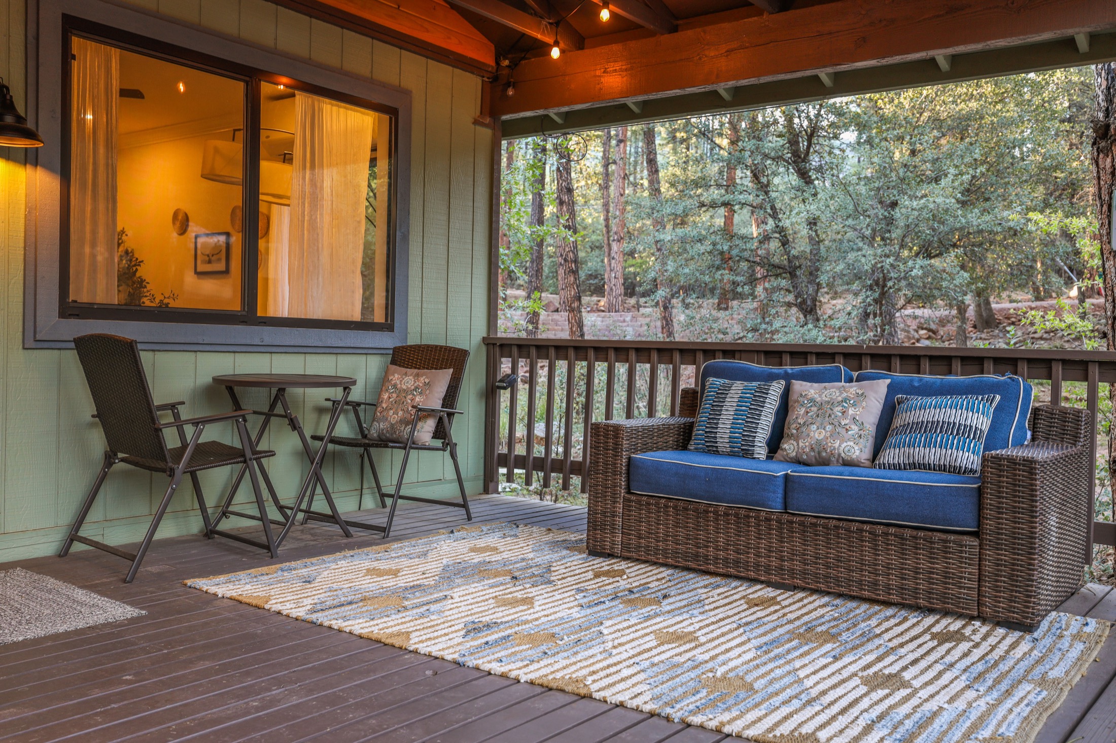 Covered deck lounge with seating for a slow morning together